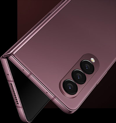 Galaxy Z Fold4 seen upside down from the rear in the Online exclusive color, Burgundy.